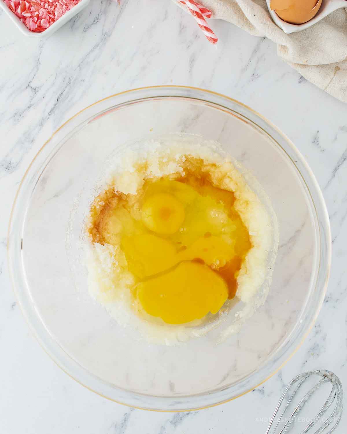 Melted butter, granulated sugar, eggs and vanilla combined in a large mixing bowl.