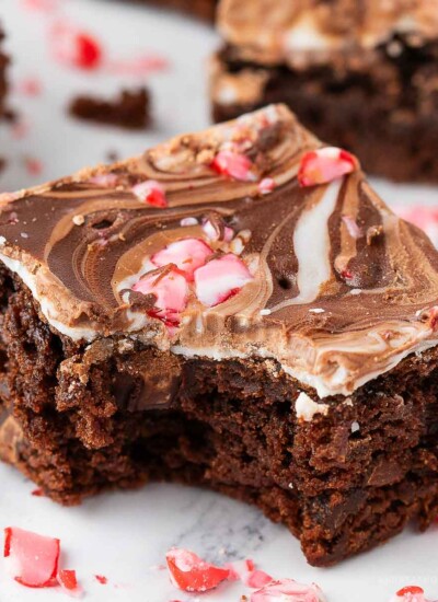 Bite out of a fudgy chocolate peppermint bark brownie.