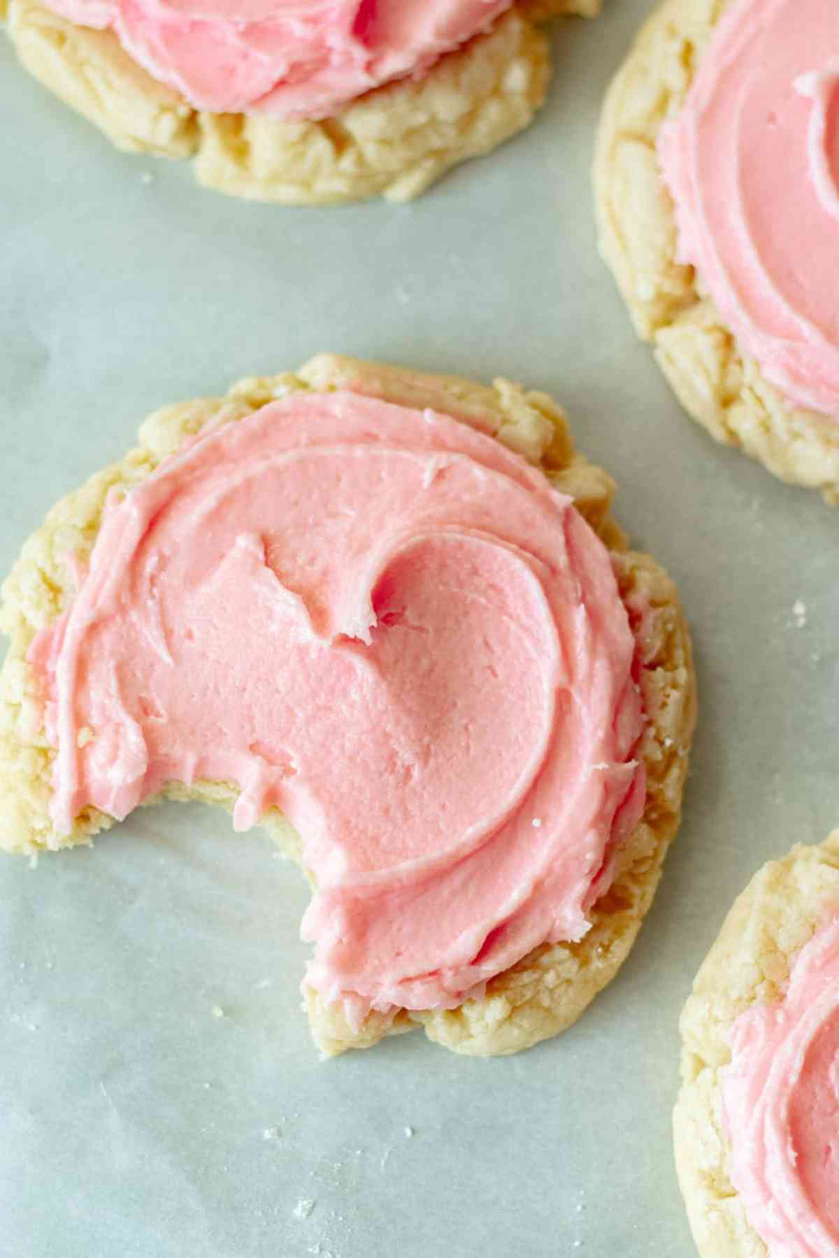 Copycal Crumbl cookies with pink frosting.