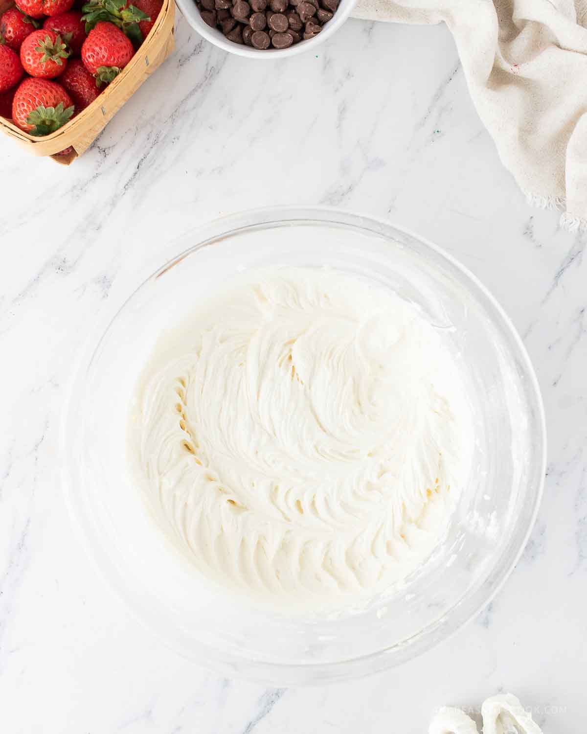 Softened butter creamed in a bowl.