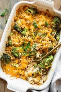 Casserole dish full of healthy chicken and broccoli pasta casserole.